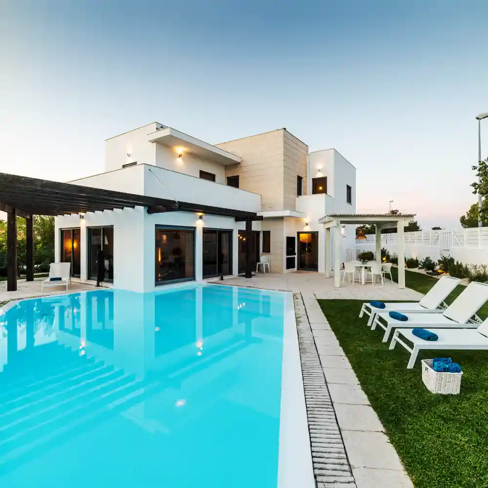 Modern house with garden swimming pool and wooden pergula