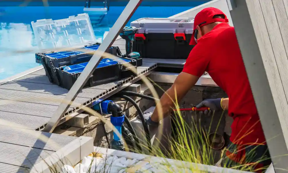 Technician Fixing Swimming Pool Heating System